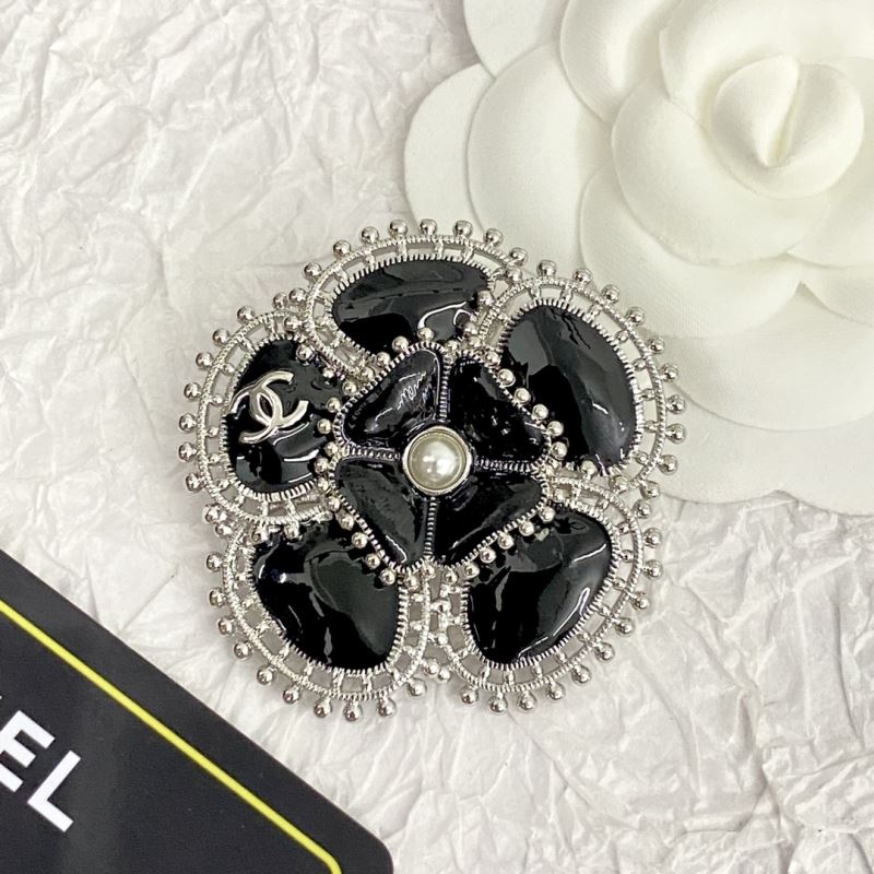 Ch**el brooches